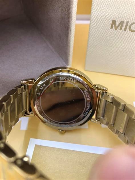 michael kors authentication code watch|where is Michael Kors made.